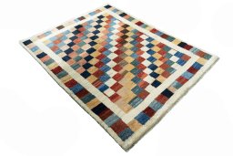 Close-up detail of 2000s Persian Gabbeh rug from Iran / Persia showing Wool weave