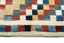 Central medallion detail of 2000s Persian Gabbeh rug from Iran / Persia