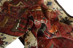 Corner detail of 2000s Persian Gabbeh rug showing border pattern and Wool pile