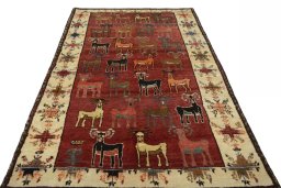 Surface texture of 2000s Persian Gabbeh rug with natural Wool and intricate pattern
