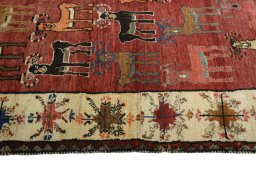 Close-up detail of 2000s Persian Gabbeh rug from Iran / Persia showing Wool weave