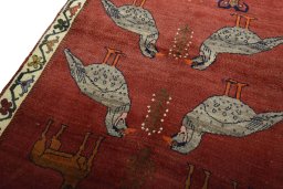 Backside of handmade 2000s Persian Gabbeh rug showing knot structure and weave density