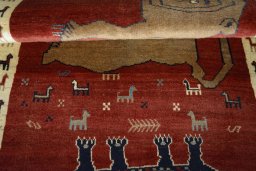 Full view of 2000s Persian Gabbeh rug from Iran / Persia, 171 × 101 cm in Red tones