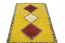 Surface texture of 2000s Persian Gabbeh rug with natural Wool and intricate pattern