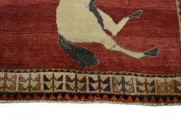 Central medallion detail of 2000s Persian Gabbeh rug from Iran / Persia