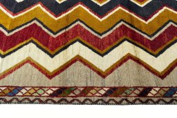 Close-up detail of 2000s Persian Gabbeh rug from Iran / Persia showing Wool weave