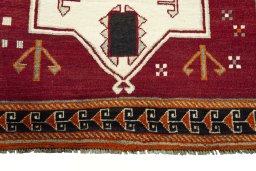 Central medallion detail of 2000s Persian Gabbeh rug from Iran / Persia