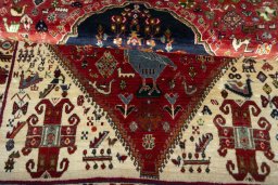 Corner detail of 2000s Persian Gabbeh rug showing border pattern and Wool pile