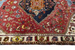 Full view of 2000s Persian Gabbeh rug from Iran / Persia, 190 × 112 cm in Red tones