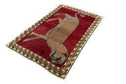 Corner detail of 2000s Persian Gabbeh rug showing border pattern and Wool pile