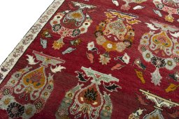 Backside of handmade 2000s Persian Gabbeh rug showing knot structure and weave density