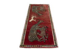 Surface texture of 2000s Persian Gabbeh rug with natural Wool and intricate pattern