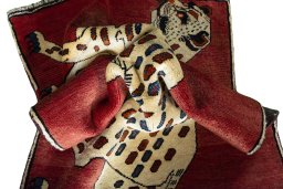 Corner detail of 2000s Persian Gabbeh rug showing border pattern and Wool pile