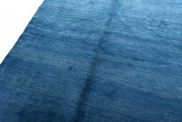 Backside of handmade New Persian Gabbeh rug showing knot structure and weave density