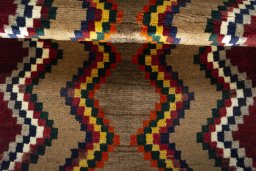 Full view of 2000s Persian Gabbeh rug from Iran / Persia, 118 × 83 cm in Multi Color tones