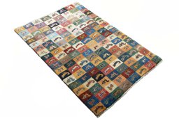 Close-up detail of 2000s Persian Gabbeh rug from Iran / Persia showing Wool weave