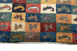 Central medallion detail of 2000s Persian Gabbeh rug from Iran / Persia