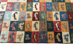 Close-up detail of 2000s Persian Gabbeh rug from Iran / Persia showing Wool weave