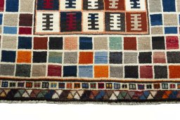 Central medallion detail of 2000s Persian Gabbeh rug from Iran / Persia