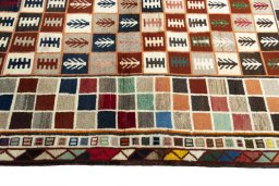 Close-up detail of 2000s Persian Gabbeh rug from Iran / Persia showing Wool weave