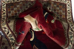 Close-up detail of 2000s Persian Gabbeh rug from Iran / Persia showing Wool weave