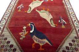 Central medallion detail of 2000s Persian Gabbeh rug from Iran / Persia