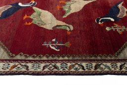 Full view of 2000s Persian Gabbeh rug from Iran / Persia, 245 × 135 cm in Red tones