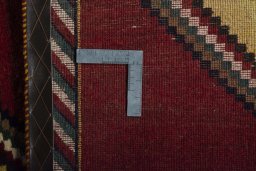 Close-up detail of 2000s Persian Gabbeh rug from Iran / Persia showing Wool weave
