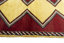 Close-up detail of 2000s Persian Gabbeh rug from Iran / Persia showing Wool weave