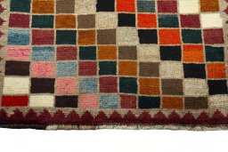 Central medallion detail of 2000s Persian Gabbeh rug from Iran / Persia