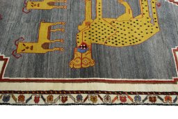 Close-up detail of 2000s Persian Gabbeh rug from Iran / Persia showing Wool weave