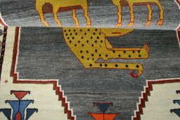 Full view of 2000s Persian Gabbeh rug from Iran / Persia, 198 × 111 cm in Gray tones
