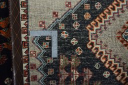 Close-up detail of 2000s Persian Gabbeh rug from Iran / Persia showing Wool weave
