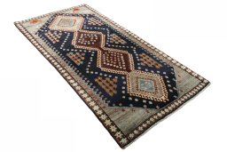 Close-up detail of 2000s Persian Gabbeh rug from Iran / Persia showing Wool weave