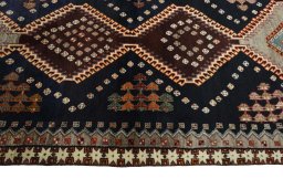 Close-up detail of 2000s Persian Gabbeh rug from Iran / Persia showing Wool weave