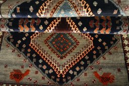 Full view of 2000s Persian Gabbeh rug from Iran / Persia, 222 × 111 cm in Blue tones