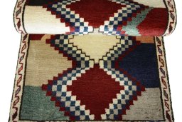 Full view of 2000s Persian Gabbeh rug from Iran / Persia, 144 × 66 cm in Multi Color tones