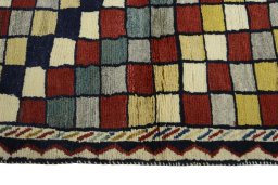 Close-up detail of 2000s Persian Gabbeh rug from Iran / Persia showing Wool weave