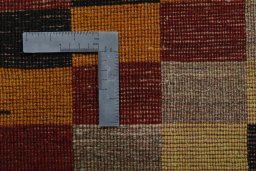 Close-up detail of 2000s Persian Gabbeh rug from Iran / Persia showing Wool weave