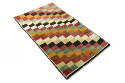 Close-up detail of 2000s Persian Gabbeh rug from Iran / Persia showing Wool weave