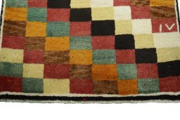 Central medallion detail of 2000s Persian Gabbeh rug from Iran / Persia