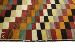 Close-up detail of 2000s Persian Gabbeh rug from Iran / Persia showing Wool weave
