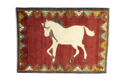 Full view of 2000s Persian Gabbeh rug from Iran / Persia, 127 × 92 cm in Red tones