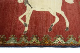 Close-up detail of 2000s Persian Gabbeh rug from Iran / Persia showing Wool weave