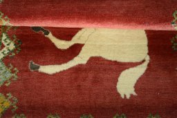 Full view of 2000s Persian Gabbeh rug from Iran / Persia, 127 × 92 cm in Red tones