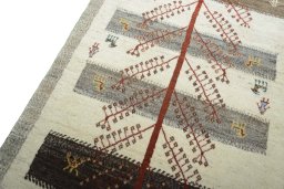 Backside of handmade New Persian Gabbeh rug showing knot structure and weave density