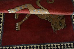 Full view of 2000s Persian Gabbeh rug from Iran / Persia, 110 × 86 cm in Red tones