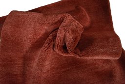 Corner detail of New Persian Gabbeh rug showing border pattern and Wool pile