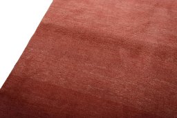 Backside of handmade New Persian Gabbeh rug showing knot structure and weave density