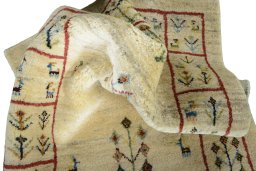 Corner detail of New Persian Gabbeh rug showing border pattern and Wool pile